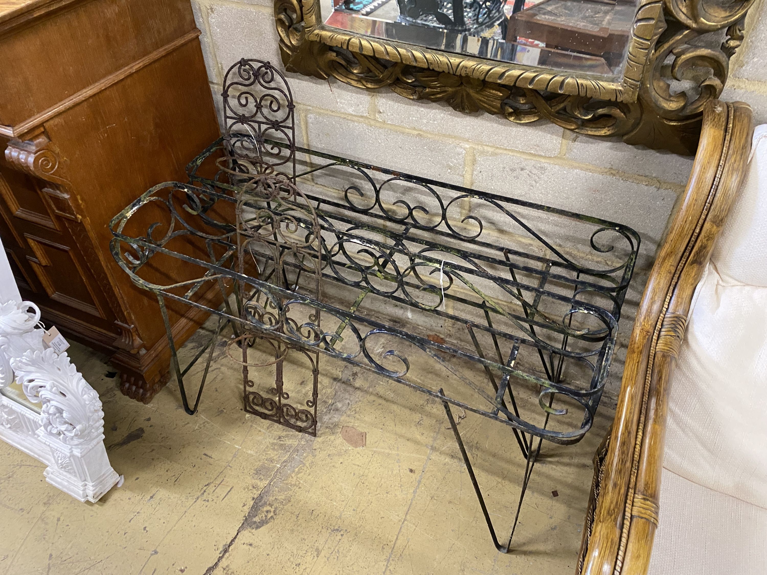 A pair of metal wrought iron pot stands, width 107cm, height 62cm together with two wrought iron wall mounted pot holders, larger height 72cm